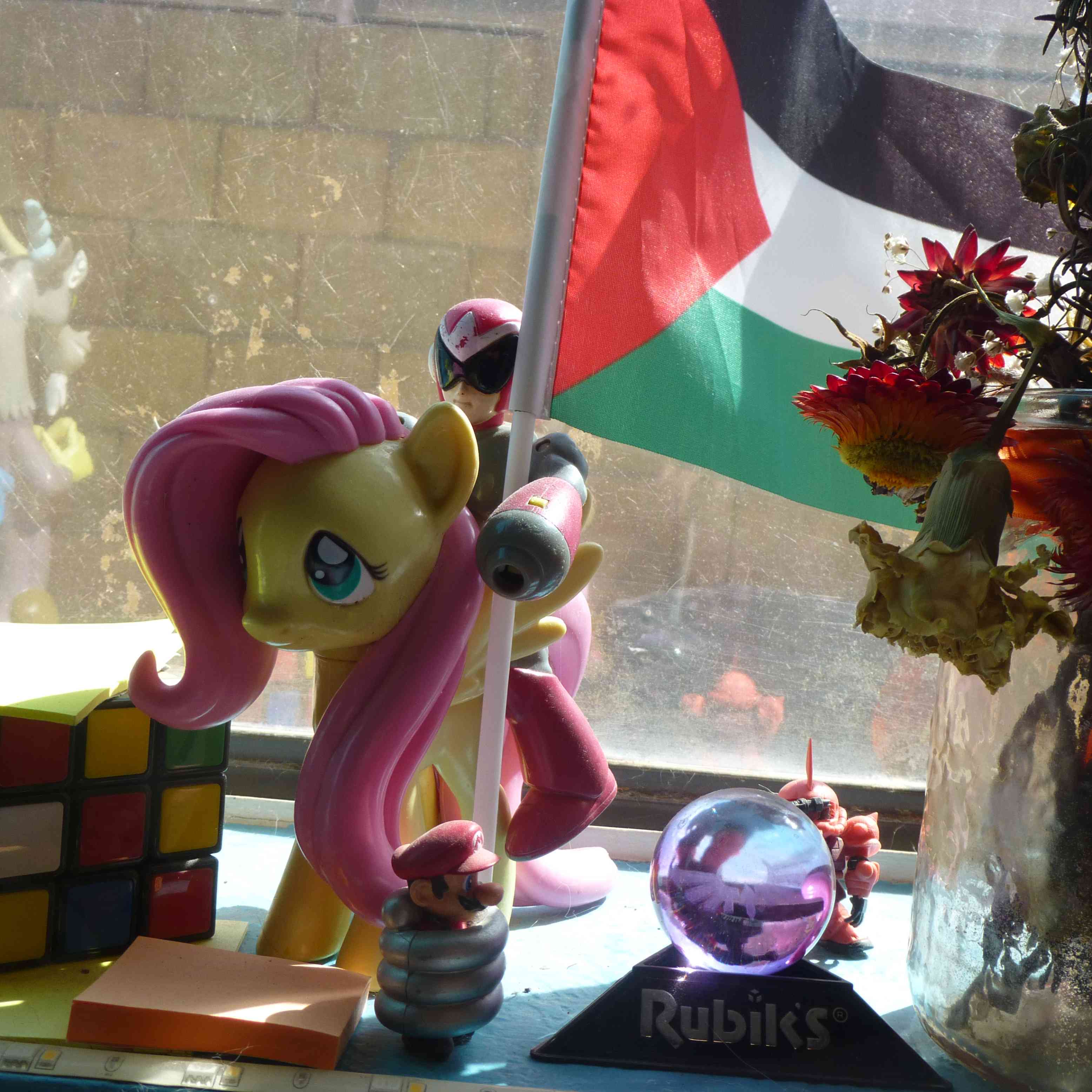 proto-man riding fluttershy holding a palestine flag (awesome I know)