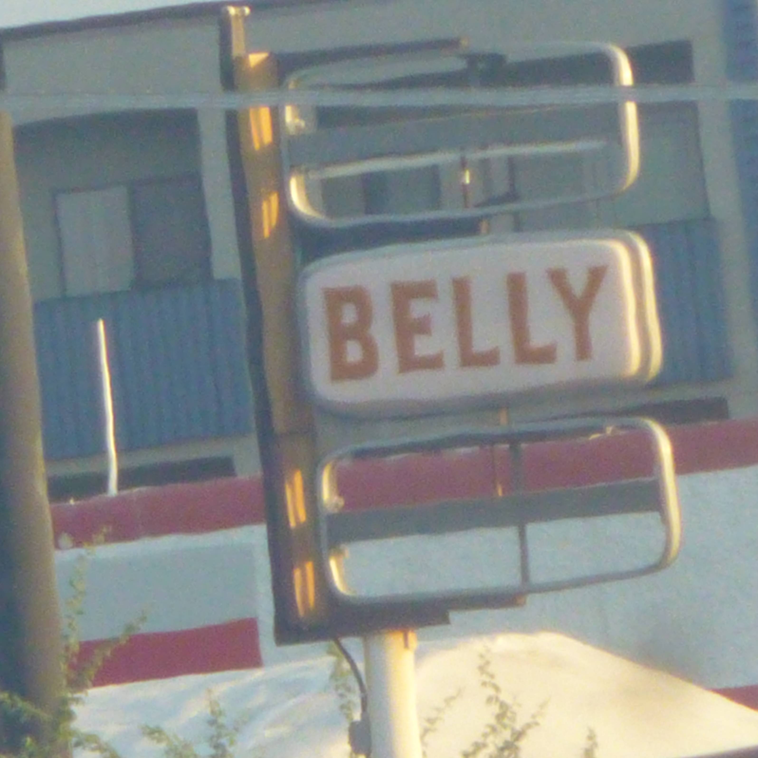 sign that's missing words and only says belly